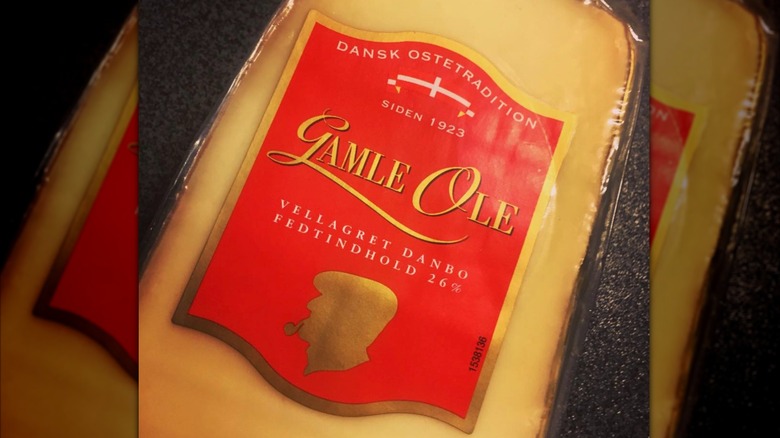 Plastic-wrapped wedge of gamle ole cheese