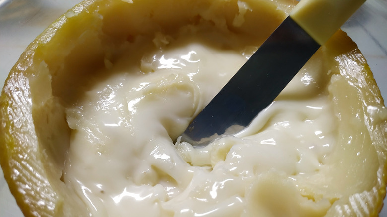 Close up of the gooey interior of a torta del casar cheese