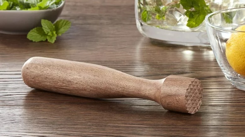 wood muddler on table