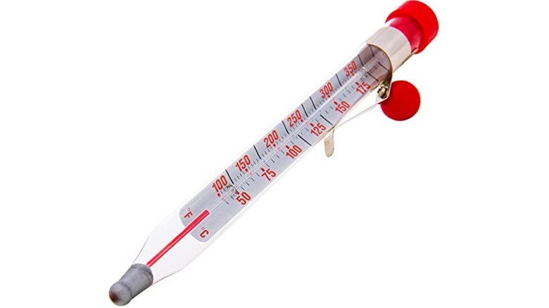candy thermometer on white background