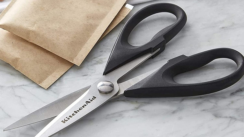 kitchen shears on marble counter