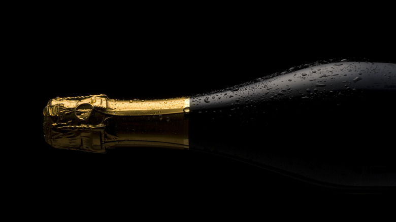 Champagne bottle on its side