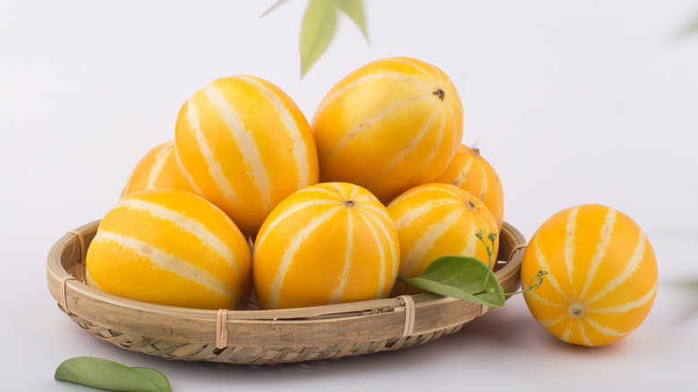 Bowl of whole melons