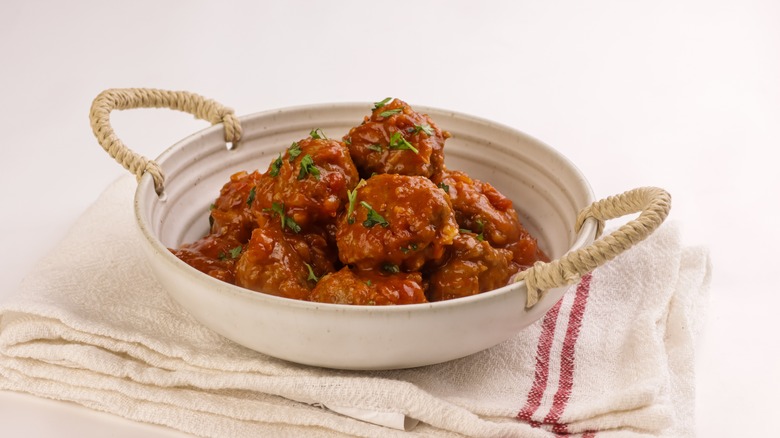 Albóndigas en salsa in a white bowl