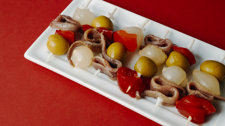 Rectangular white platter of banderillas