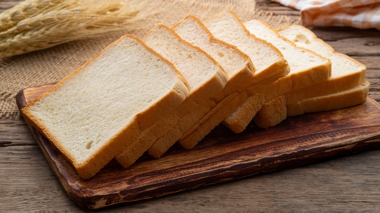 sliced bread on wooden board