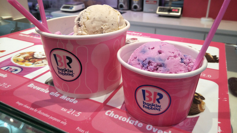 Two Baskin-Robbins ice cream cups