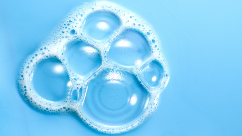soap bubbles on blue background
