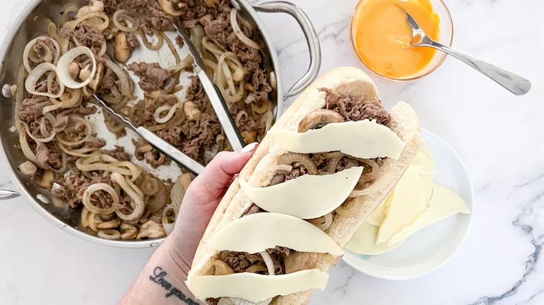 Assembling a Philly Cheesesteak