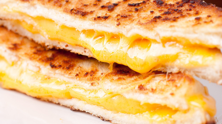 Sliced grilled cheese sandwich