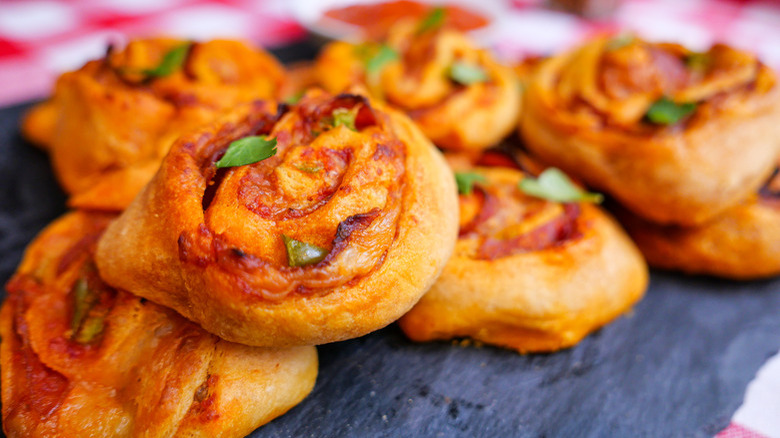 Stack of pepperoni pizza pinwheels