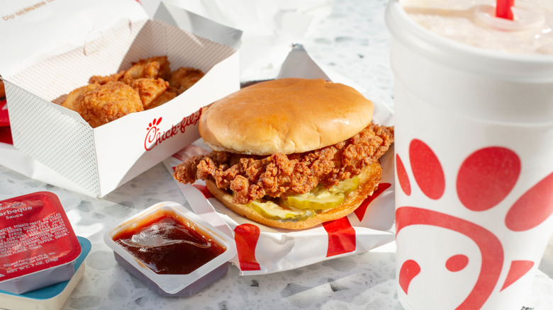 Chick-fil-a combo meal with chicken sandwich, nuggets, barbecue sauce and drink