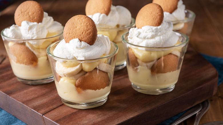homemade banana pudding in glasses with wafers