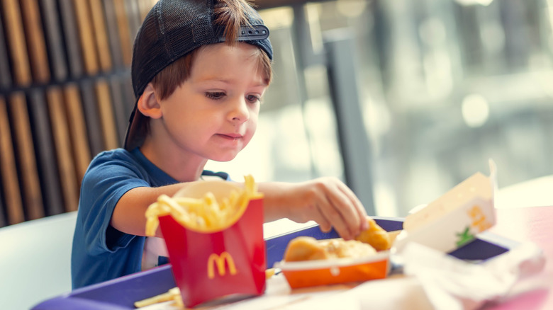A child eats McDonalds