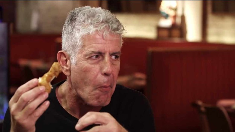 Anthony Bourdain eats chicken