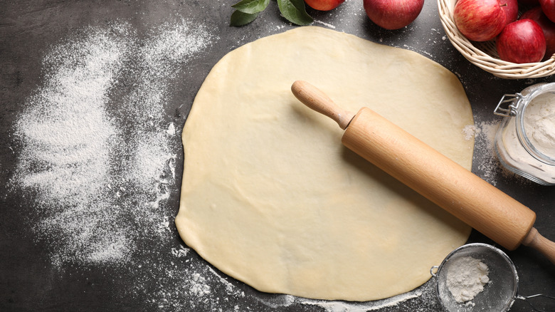Rolled out dough with rolling pin