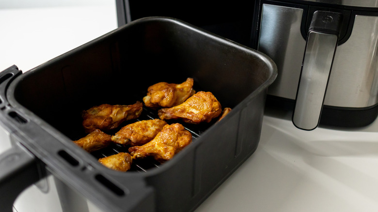 Chicken wings resting in the air fryer