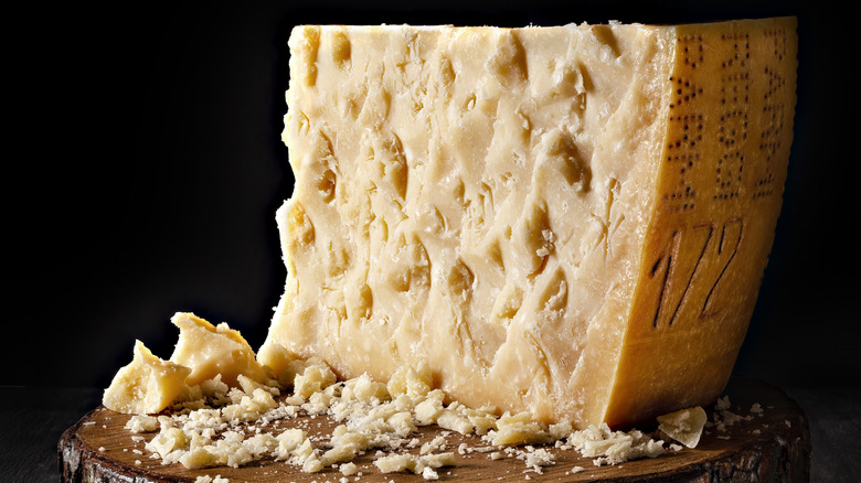 a large portion of an authentic Parmigiano Reggiano wheel of cheese