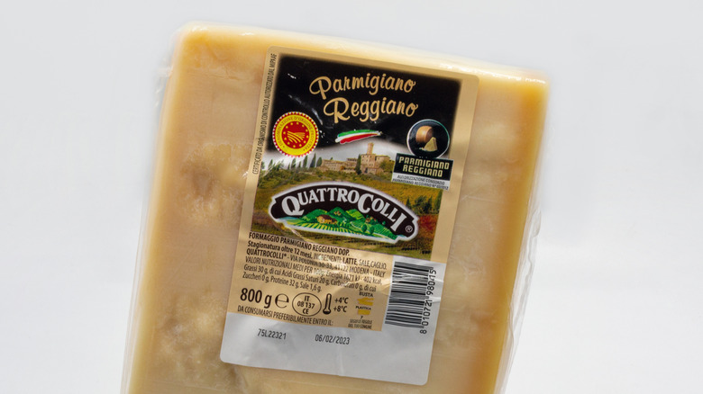 packaged slice of Parmigiano Reggiano with authenticity labels