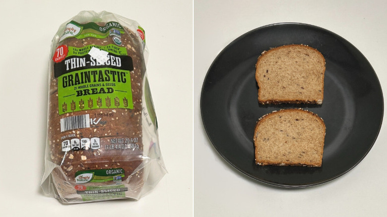 Loaf of Simply Nature Graintastic Bread beside a black plate of bread