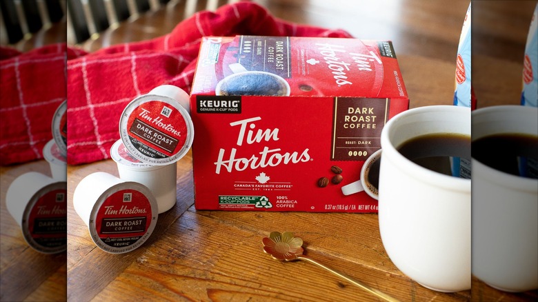 Tim Hortons k-cups and box with coffee cup and gold spoon