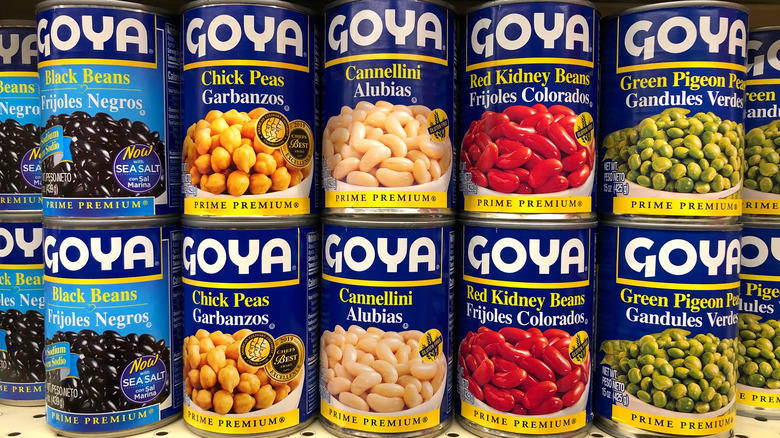 Stacked cans of Goya beans