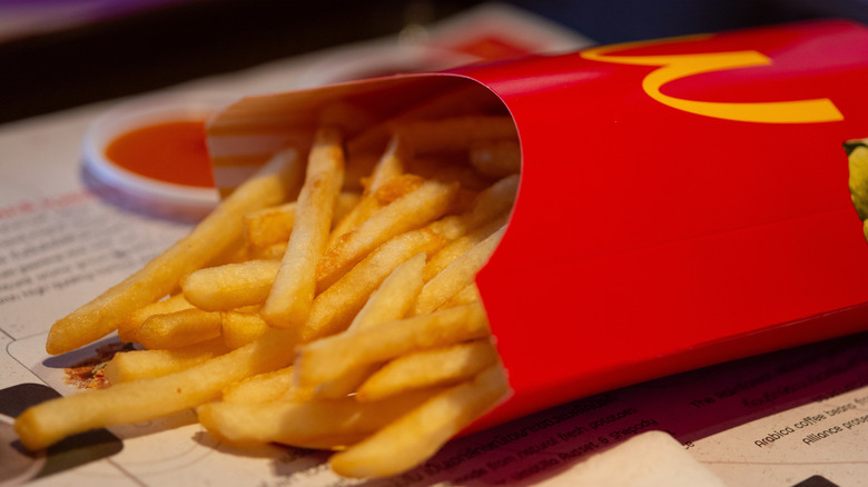 McDonald's french fries laying on table