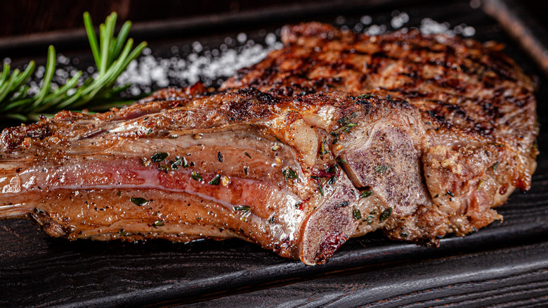 Tomahawk steak on plank