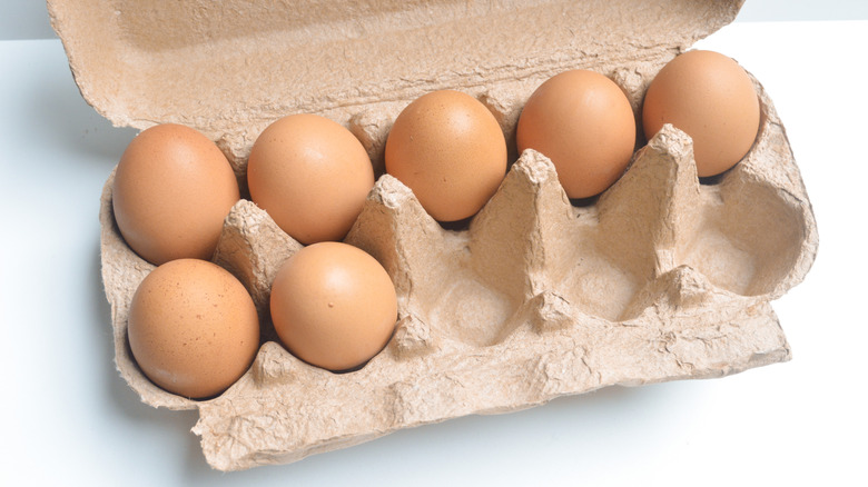 A partially-empty carton of eggs