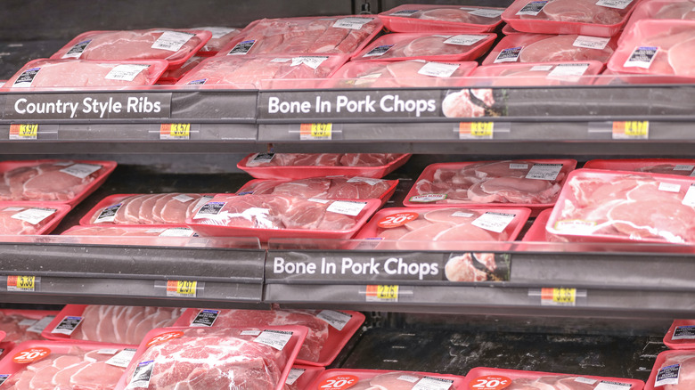 packages of pork on store shelf