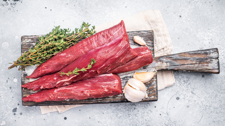 Lamb tenderloin pieces on