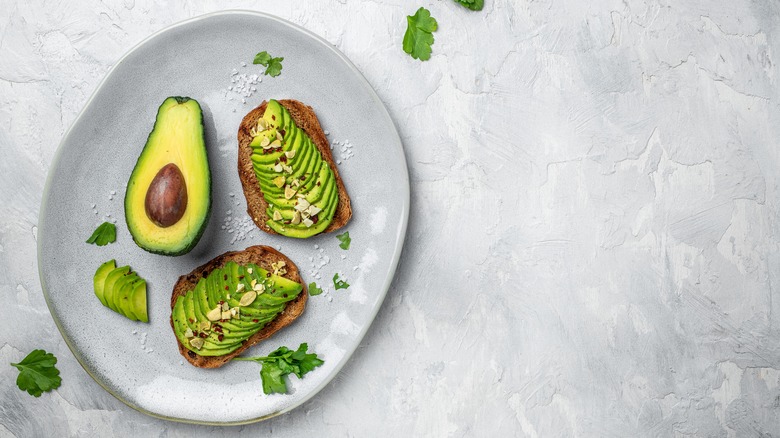 Gray plate with avocado toast