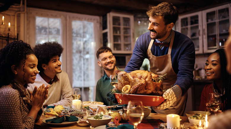 Christmas dinner table with people