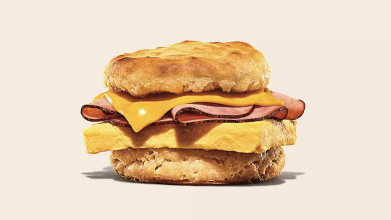 A ham egg and cheese biscuit from Burger King against a white background.