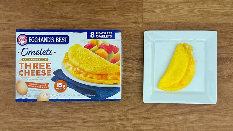 Package and serving of Eggland's Best Omelets Three Cheese on square white plate