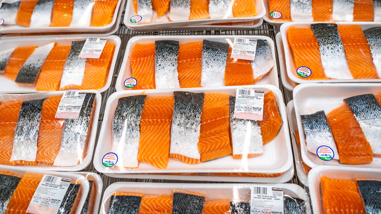 Packs of Costco Kirkland Signature salmon fillets on display in Costco store
