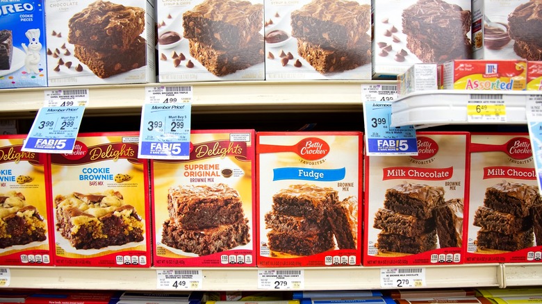 row of Betty Crocker brownie boxes on shelf