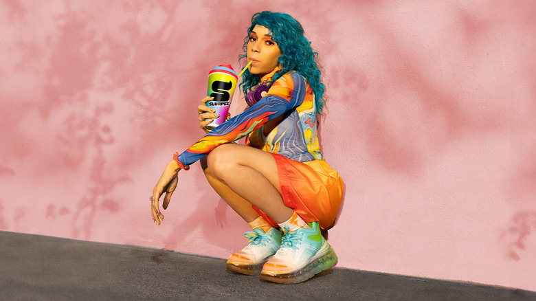 Person drinking 7-Eleven's new Slurpee 