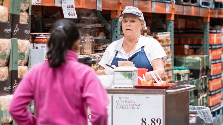 Woman at Costco sample station