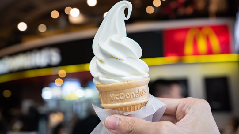 hand holding vanilla soft serve