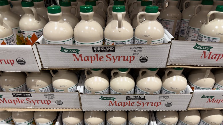 Kirkland Signature maple syrup stacked in boxes