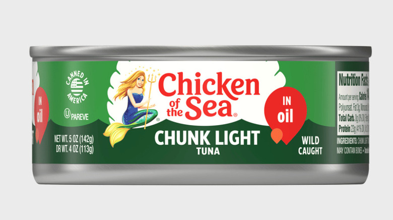A shelf of Chicken of the Sea canned tuna