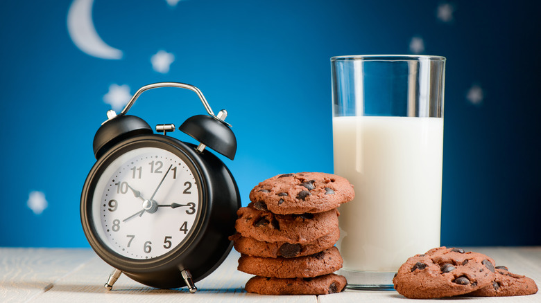 milk with cookies and alarm clock