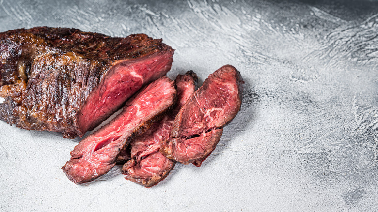 Sliced, rare hanger steak with a seared exterior