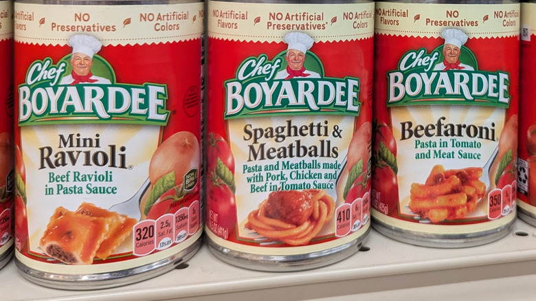 Three cans of different types of Chef Boyardee pasta next to each other