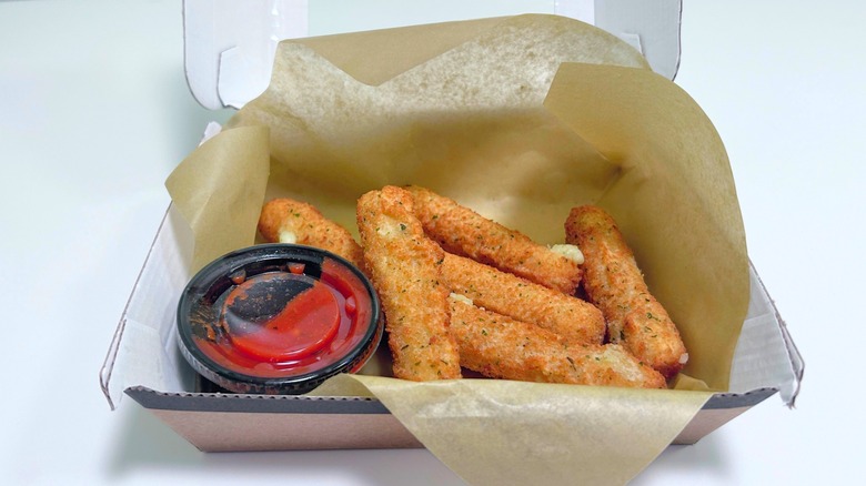 Buffalo Wild Wings mozzarella sticks isolated on a white background