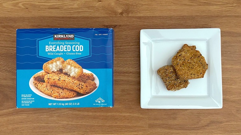 Kirkland Signature Everything Seasoning Breaded Cod package and prepared cod on white square plate