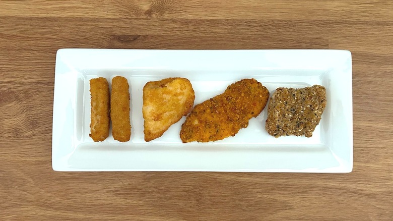 Assorted cooked frozen prepared seafood from Costco on rectangular white plate