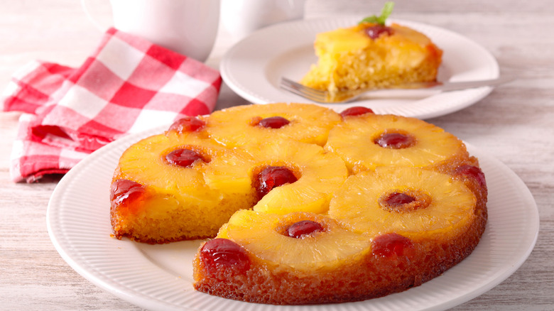 Pineapple upside down cake on white plate