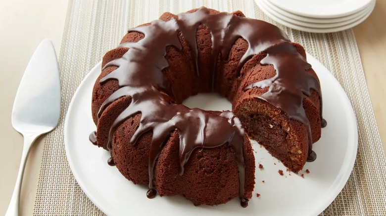 Tunnnel of fudge cake on white plate